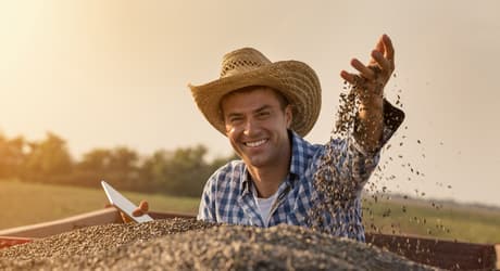 man throwing seeds