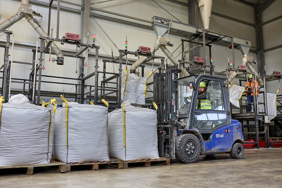Large storage bags holding plastic granulate