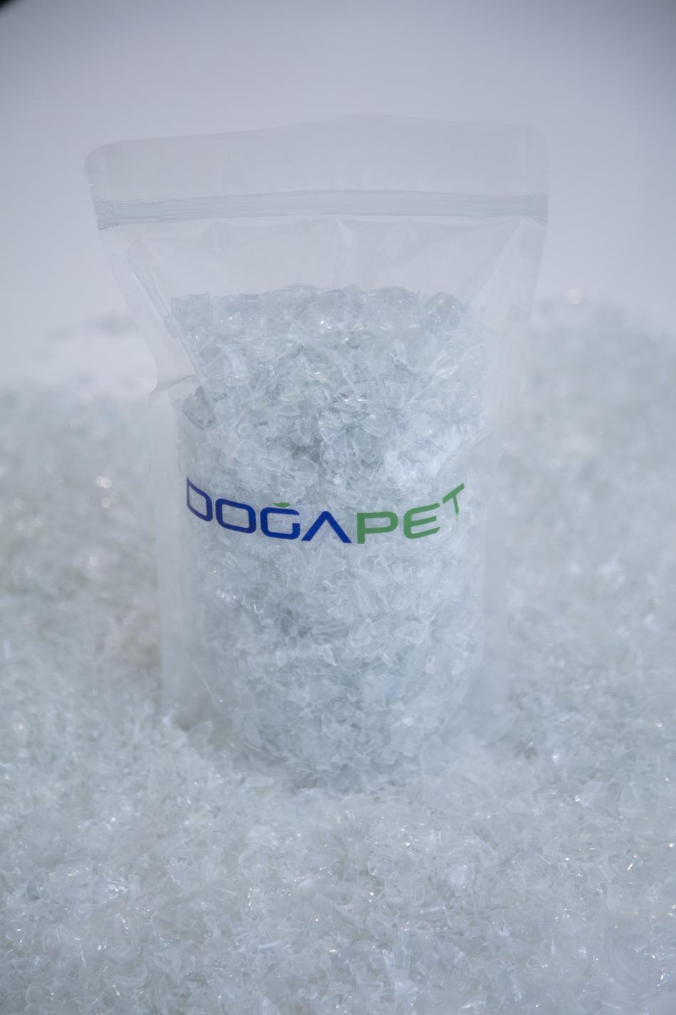 PET flakes in a bag with Doga PET logo