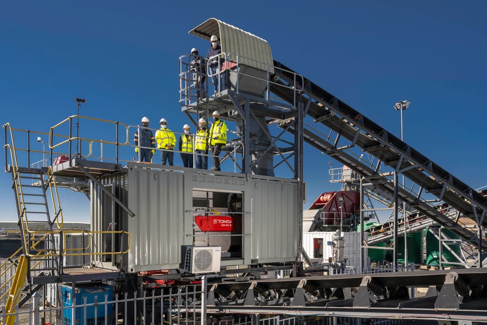 People standing on top of the TOMRA COM XRT 300 at Letseng diamond mine