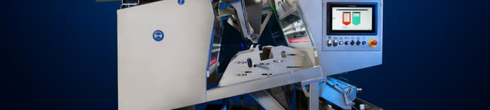 An image of the TOMRA 4C optical sorting machine on a dark background