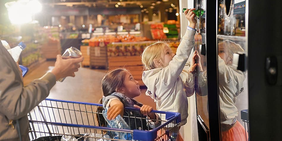children returning bottles