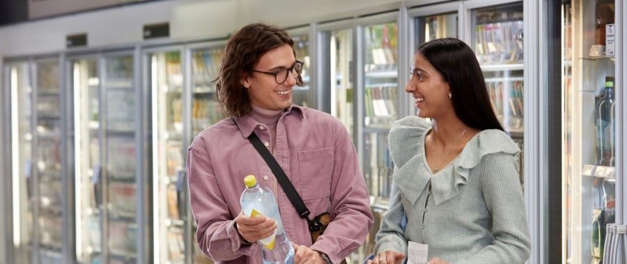 Couple looking at beverages