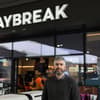 White man in front of a Daybreak store