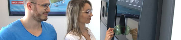 Men and woman return empty plastic containers to the reverse vending machine