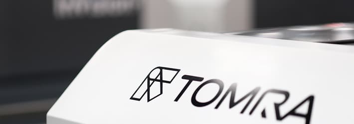 Portion of InVision2 food sorting machine showing TOMRA logo