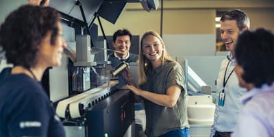 people with a collection machine