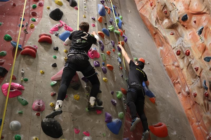 Employee out office bouldering 
