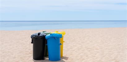 plastic bins on beach
