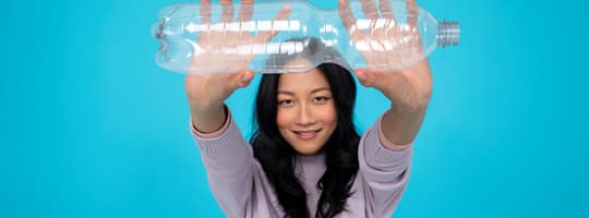 Woman with plastic for container materials