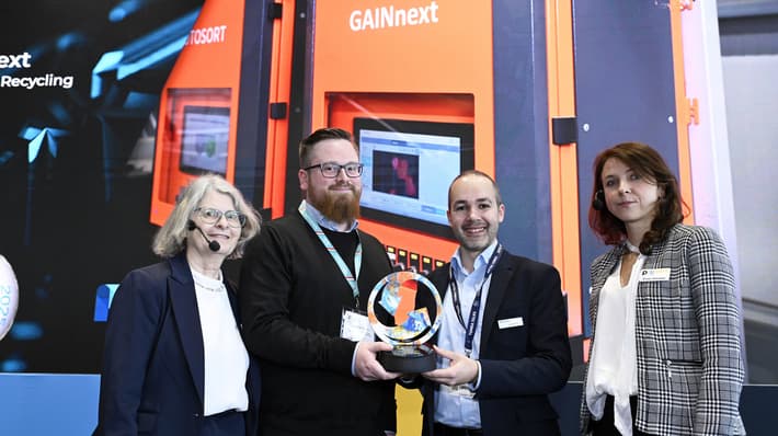 Team recieving the Recycling Machinery Innovation of the Year award