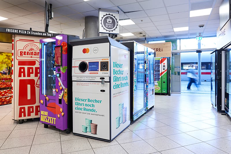 TOMRA RECUP freestanding return machine installed at market at Freiburg central train station