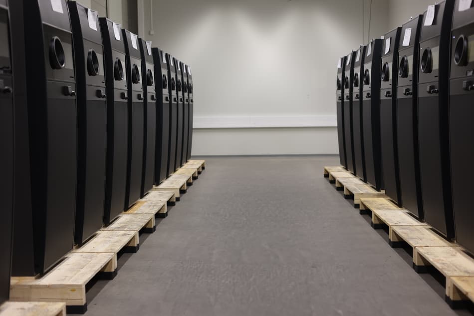 TOMRA T9 reverse vending machines lined up and ready for delivery