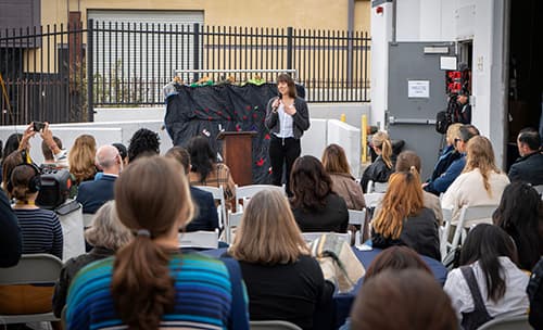 Louisa Hoyes, Director of Strategic Partnerships at TOMRA Textiles, speaking at the Homeboy Threads event.