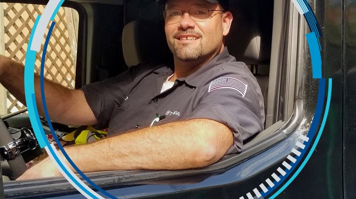 Man in truck with TOMRA Orbit