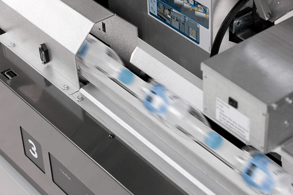 TOMRA sensor in reverse vending machine identifies types of bottles