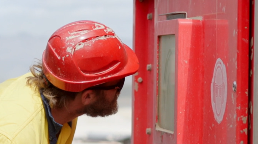 Video: Man looking into machine