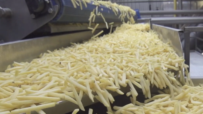 Image: Potato chips on machine 
